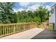 Wide wood deck with railing overlooking the surrounding yard at 0 Sawmill, Cedar Grove, NC 27231