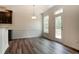 Bright dining room with access to outdoor deck and adjacent kitchen at 0 Sawmill, Cedar Grove, NC 27231