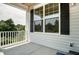 Cozy front porch with classic white railings, offering a welcoming outdoor space at 0 Sawmill, Cedar Grove, NC 27231
