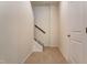 Bright hallway with a staircase, neutral-toned walls, carpet, and white trim at 0 Sawmill, Cedar Grove, NC 27231