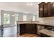 Modern kitchen with stainless appliances and granite countertops open to dining area at 0 Sawmill, Cedar Grove, NC 27231