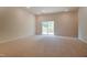 Spacious living room with carpet and sliding doors to a deck at 0 Sawmill, Cedar Grove, NC 27231