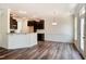Well-lit area transitions between living space and open kitchen with modern design at 0 Sawmill, Cedar Grove, NC 27231