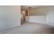 Upstairs loft with neutral carpet, light walls, base molding and access to additional rooms at 0 Sawmill, Cedar Grove, NC 27231