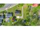 Overhead shot of the property, displaying the house, driveway, yard, and the nearby neighborhood at 1017 S Second Ave, Siler City, NC 27344