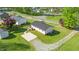 Residential neighborhood featuring well-maintained lawns, paved driveway, and a metal roof at 1017 S Second Ave, Siler City, NC 27344