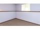 Finished basement with carpet and window at 103 Wesker Cir, Durham, NC 27703
