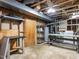 Basement area with water heater, washer, dryer, and workbench at 103 Wesker Cir, Durham, NC 27703
