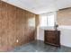 Basement room with paneling and a small window at 103 Wesker Cir, Durham, NC 27703