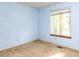 Bedroom featuring a window and carpeted floor at 103 Wesker Cir, Durham, NC 27703