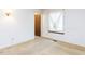 Bright bedroom featuring carpet and a window for natural light at 103 Wesker Cir, Durham, NC 27703