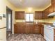 Well-lit kitchen featuring ample cabinet space and durable countertops at 103 Wesker Cir, Durham, NC 27703