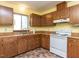 Functional kitchen layout with ample cabinetry and an efficient appliance arrangement at 103 Wesker Cir, Durham, NC 27703