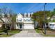 Inviting two-story home with a well-maintained front yard and a classic design with dormer windows at 104 Mainline Sta, Morrisville, NC 27560
