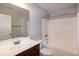 Full bathroom features large mirror and shower-tub combination at 104 Mainline Sta, Morrisville, NC 27560