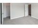 The bedroom features neutral walls and carpet, with doors to the closet and hallway at 104 Mainline Sta, Morrisville, NC 27560