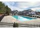Community pool with clean, clear water in a neighborhood setting at 104 Mainline Sta, Morrisville, NC 27560