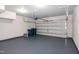 Spacious two-car garage with an automatic door and epoxy flooring at 104 Mainline Sta, Morrisville, NC 27560