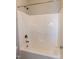A pristine, all-white shower with a shower head and sleek fixtures at 104 Mainline Sta, Morrisville, NC 27560
