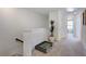 Upstairs hallway features a cozy pet bed, adding a touch of home at 107 Sepals Pl, Wendell, NC 27591