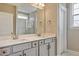 Bathroom featuring double sink vanity with gray cabinets, white countertops, and chrome fixtures at 1073 Fairhaven Dr # 52, Mebane, NC 27302