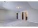 Spacious bedroom featuring neutral carpet, ensuite bathroom, and a walk-in closet at 1073 Fairhaven Dr # 52, Mebane, NC 27302