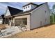 Angle view of a gray home with a two-car garage still under construction at 1073 Fairhaven Dr # 52, Mebane, NC 27302