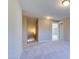 Hallway with plush carpet, staircase and lighting at 1073 Fairhaven Dr # 52, Mebane, NC 27302