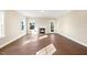 Inviting living room featuring a fireplace, large windows, and a backyard door at 1073 Fairhaven Dr # 52, Mebane, NC 27302