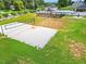 Sand volleyball court and community pool provide residents recreational activities amid green surroundings at 1073 Fairhaven Dr # 52, Mebane, NC 27302