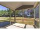 View from the screened porch of a new home with trees in the background at 1073 Fairhaven Dr # 52, Mebane, NC 27302