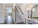Bright foyer with hardwood floors, a modern table, and access to the living area at 111 Sepals Pl, Wendell, NC 27591