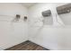 Walk-in closet with wire shelving and modern wood look floors at 1116 Ciandra Barn Way, Apex, NC 27523