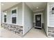 Inviting front entrance showcasing stone accents, a modern door, and a welcoming entryway at 1116 Ciandra Barn Way, Apex, NC 27523
