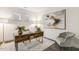 Cozy office with modern desk, stylish lamp, neutral chair, and decorative rug at 1116 Ciandra Barn Way, Apex, NC 27523