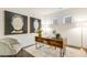 Charming office showcases sleek desk, artistic wall decor, and comfortable neutral chair at 1116 Ciandra Barn Way, Apex, NC 27523