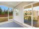 Covered patio with outdoor rug offers a relaxing outdoor space, connected to dining room at 1116 Ciandra Barn Way, Apex, NC 27523