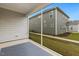 Covered patio with outdoor rug offers a relaxing outdoor space overlooking the yard at 1116 Ciandra Barn Way, Apex, NC 27523