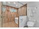 Modern bathroom with glass-enclosed shower and separate soaking tub at 11209 Sedgefield Dr, Raleigh, NC 27613