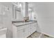 Clean bathroom with double vanity sinks and bright lighting at 11209 Sedgefield Dr, Raleigh, NC 27613