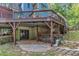 Features a raised deck, under-deck storage, and concrete patio at 11209 Sedgefield Dr, Raleigh, NC 27613