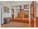 Spacious foyer with staircase, hardwood floors, and traditional decor, offering a grand entrance at 11209 Sedgefield Dr, Raleigh, NC 27613