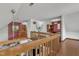 View from the second floor loft shows open railing and the living space below at 11209 Sedgefield Dr, Raleigh, NC 27613