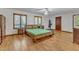 Spacious main bedroom with hardwood floors and natural light at 11209 Sedgefield Dr, Raleigh, NC 27613