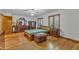 Spacious main bedroom with hardwood floors, ample closet, and natural light at 11209 Sedgefield Dr, Raleigh, NC 27613