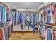 Large walk-in closet with ample hanging space and storage at 11209 Sedgefield Dr, Raleigh, NC 27613