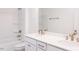 Bathroom featuring double sink vanity, large mirror, and shower-tub combination at 113 Sepals Pl, Wendell, NC 27591