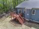 Backyard featuring a wooden deck with stairs at 115 Buckskin Dr, Louisburg, NC 27549