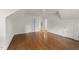 Large bedroom with natural light, high ceilings, and hardwood floors looks well-maintained at 119 Montgomery St, Raleigh, NC 27607