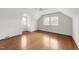 Large bedroom with natural light, hardwood floors and baseboard heating looks clean and move-in ready at 119 Montgomery St, Raleigh, NC 27607